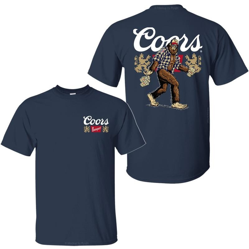 Bigfoot Coors Banquet T-Shirt, Sasquatch Holding Coors Banquet Beer Cans 2 Sided Graphic Printed Unisex Classic Comfort Cotton T-Shirt