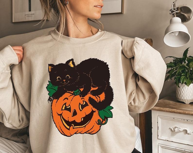 Black Cat Pumpkin T-Shirt Sweatshirt, Fall Sweatshirt, Halloween Sweatshirt, Black Cat Halloween Shirt, Vintage Halloween Shirt, Halloween 2024