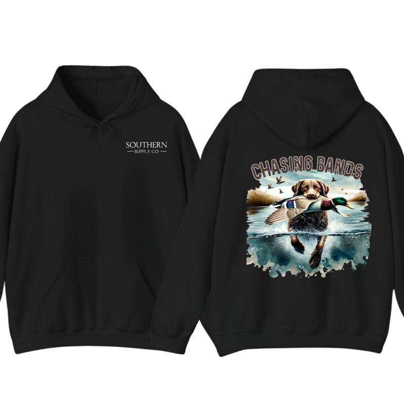 Chasing Bands Duck Hunting Hoodie - Chocolate Lab Retriever with Mallard Duck Waterfowl Graphic for Outdoor Enthusiasts, Unisex