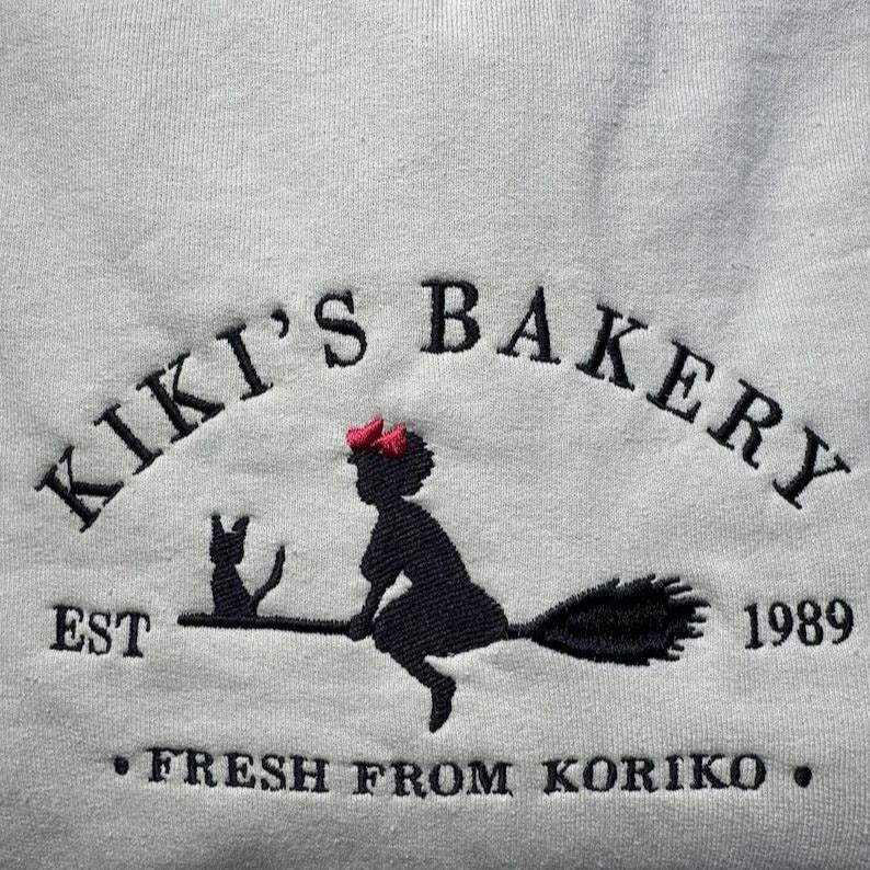 Embroidered KiKi's Bakery Unisex Crewneck Sweatshirt, Jiji Shirt, Kiki's Delivery Service, Studio Ghibli Sweatshirt, Hayao Miyazaki Shirt