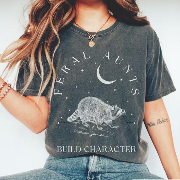 Feral Aunts Build Character T-Shirt, Raccoon Lover Aunt T-Shirt, Vintage Raccoon Art Crescent Moon Tee, Whimsigoth Aunty Tee