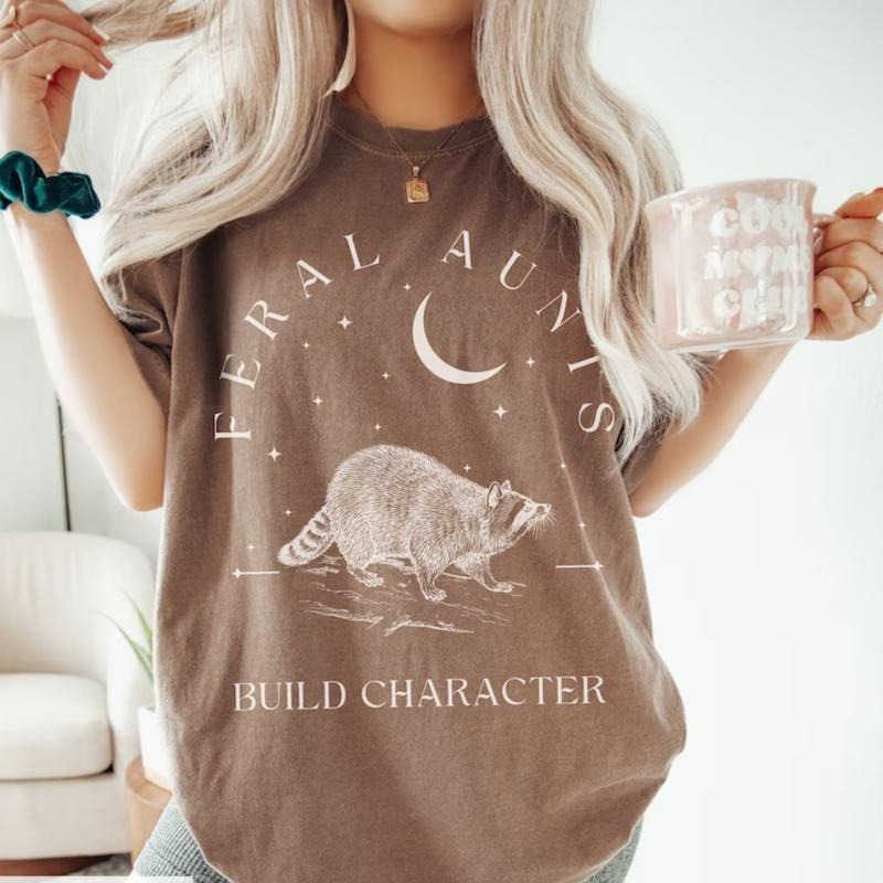 Feral Aunts Build Character T-Shirt, Raccoon Lover Aunt T-Shirt, Vintage Raccoon Art Crescent Moon Tee, Whimsigoth Aunty Tee
