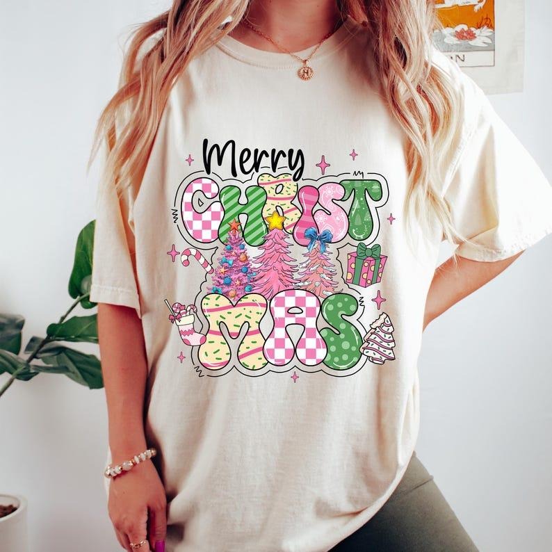 Merry Christmas Shirt, Pink Christmas,Tree, Christmas Coquette, Doodle Letters, Tis The Season,Candy Cane Hot Cocoa, Cotton, Crewneck, Graphic Tee