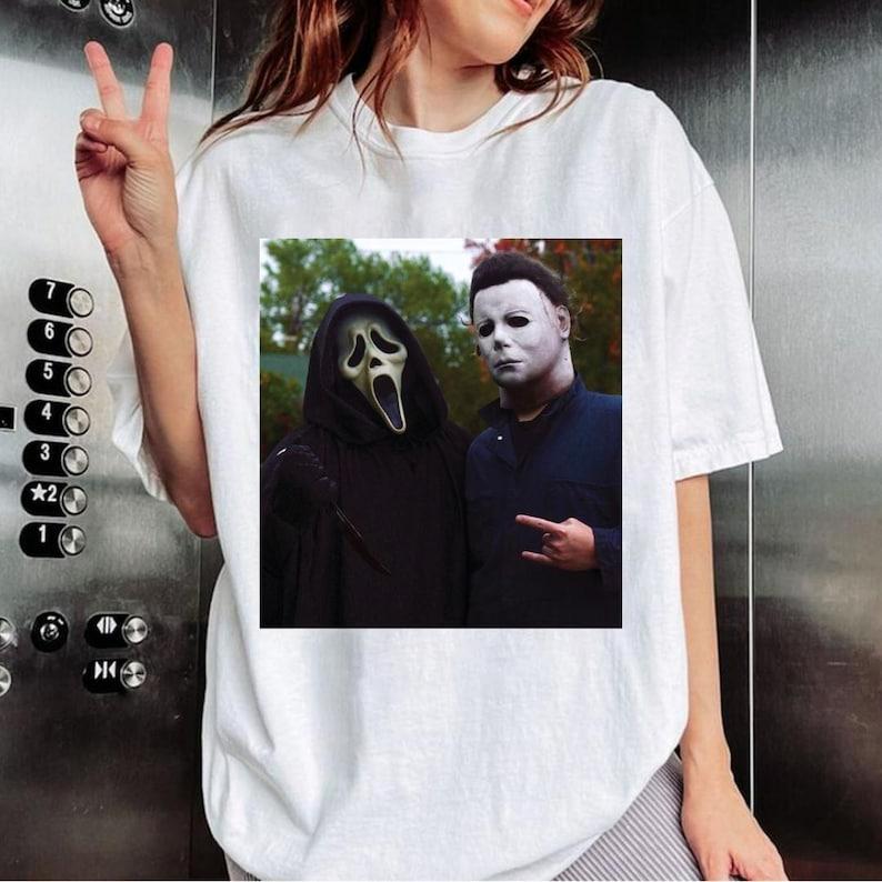 Ghostface Michael Myers Halloween Heart Hand Shirt, Horror Movie Hoodies Sweatshirts, Screamm Movie Tee, Spooky Season Top, Unisex Apparel