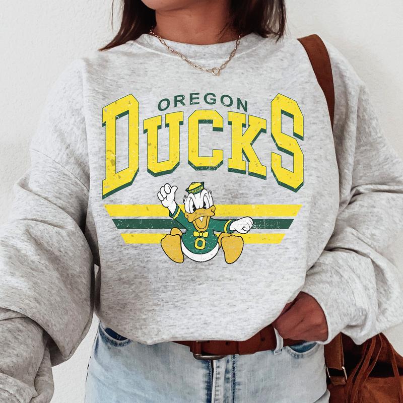 45. Oregon Ducks NCAA Vintage Sweatshirt, Classic Football Team Apparel, Sports Gift for Enthusiasts